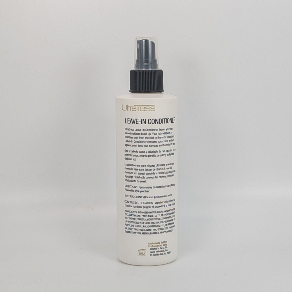 
                  
                    Load image into Gallery viewer, Ultratress Leave-In Conditioner 8 oz bottle back label showing ingredients and directions
                  
                